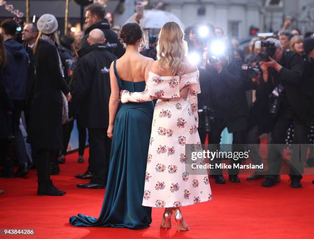Lily James and Jessica Brown Findlay attend 'The Guernsey Literary And Potato Peel Pie Society' World Premiere at The Curzon Mayfair on April 9, 2018...