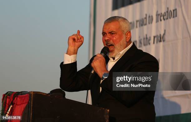 Palestinian Hamas Chief Ismail Haniyeh speaks during a protest demanding the right to return to their homeland, at the Israel-Gaza border, east of...