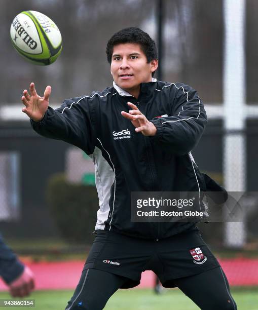 Will Lozano makes a catch during a rugby practice session at Belmont High School in Belmont, MA on April 2, 2018. When Greg Bruce first began working...