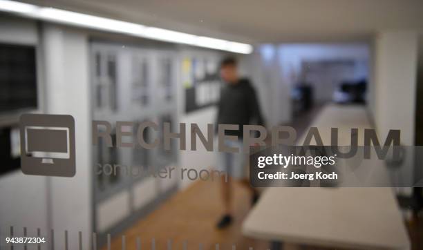 Student walks to entrance of a computer room at the Main Campus of the Technical University of Munich on April 9, 2018 in Munich, Germany. The...