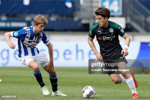 Michel Vlap of SC Heerenveen, Ritsu Doan of FC Groningen during the Dutch Eredivisie match between SC Heerenveen v FC Groningen at the Abe Lenstra...