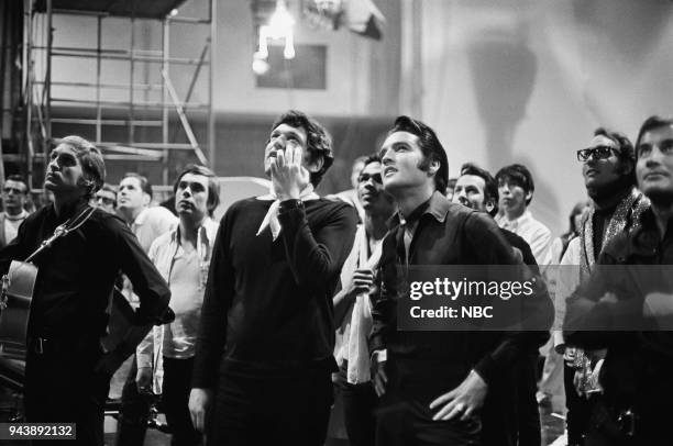 Pictured: Lance LeGault, director Steve Binder, Elvis Presley during his '68 Comeback Special on NBC --