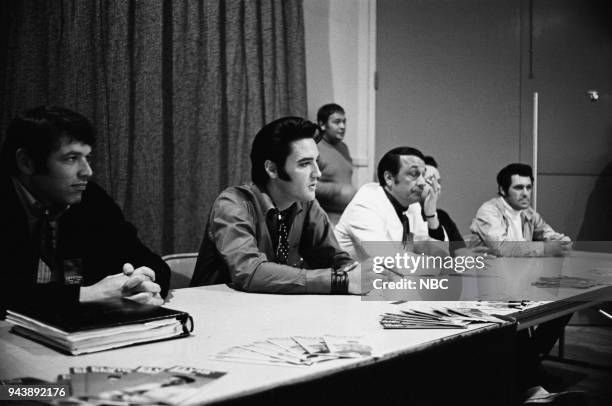 Pictured: Director Steve Binder, Elvis Presley, executive producer Bob Finkel during a press conference for the Elvis '68 Comeback Special on NBC--