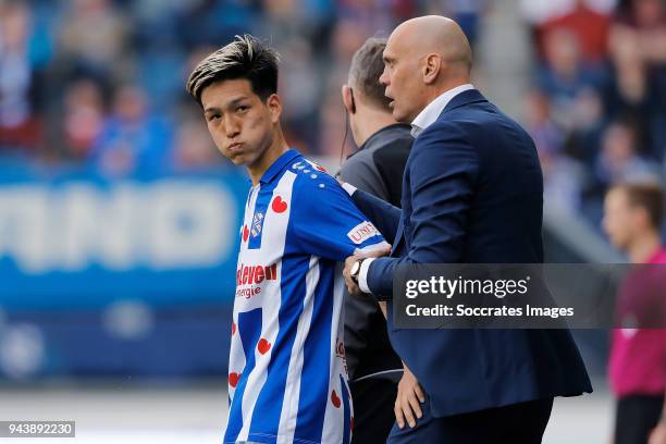 Yuki Kobayashi of SC Heerenveen, coach Jurgen Streppel of SC Heerenveen during the Dutch Eredivisie match between SC Heerenveen v FC Groningen at the...