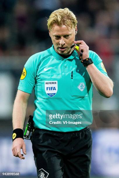 Referee Kevin Blom, talking to his assistants during the Dutch Eredivisie match between AZ Alkmaar and PSV Eindhoven at AFAS stadium on April 07,...