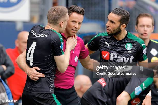 Mike te Wierik of FC Groningen, Refere Pol van Boekel, Mimoun Mahi of FC Groningen during the Dutch Eredivisie match between SC Heerenveen v FC...