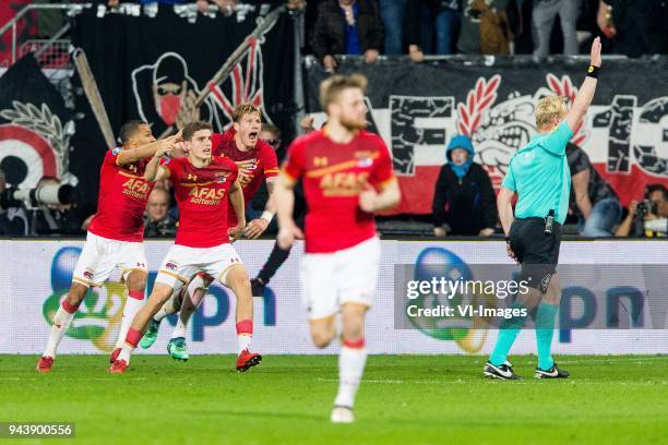 Ricardo van Rhijn of AZ, Guus Til of AZ, Wout Weghorst of AZ, Fredrik Midtsjo of AZ, referee Kevin Blom during the Dutch Eredivisie match between AZ...