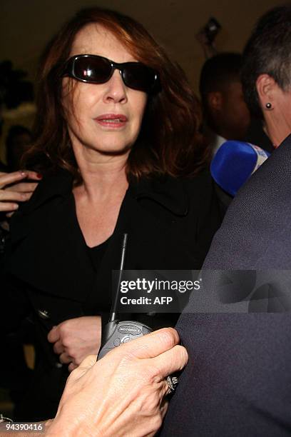 French actress Nathalie Baye arrives at Los Angeles Airport, on December 13, 2009 to visit the hospitalized French rocker Johnny Hallyday. The...