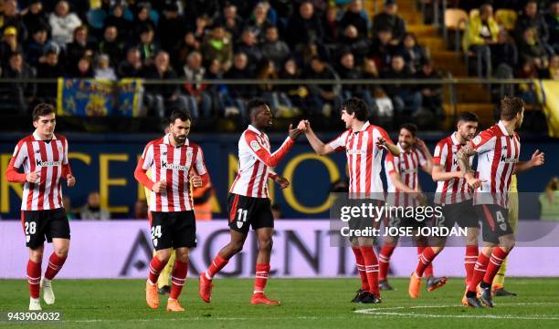 Athletic Bilbao's Spanish forward Inaki Williams celebrates with teammates after scoring during the Spanish league football match between Villarreal...