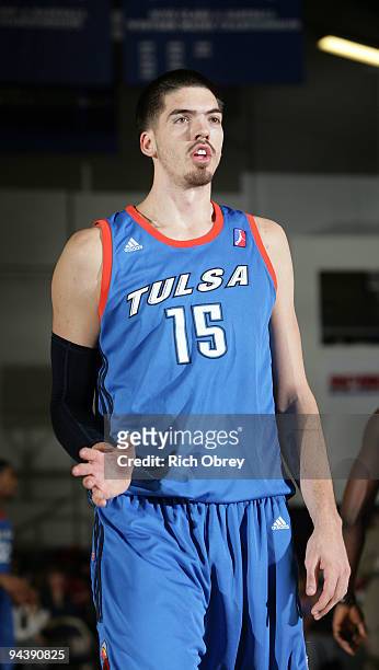Byron Mullens of the Tulsa 66ers asks a referee to watch the hand-checking during the game against the Maine Red Claws on December 13, 2009 at the...
