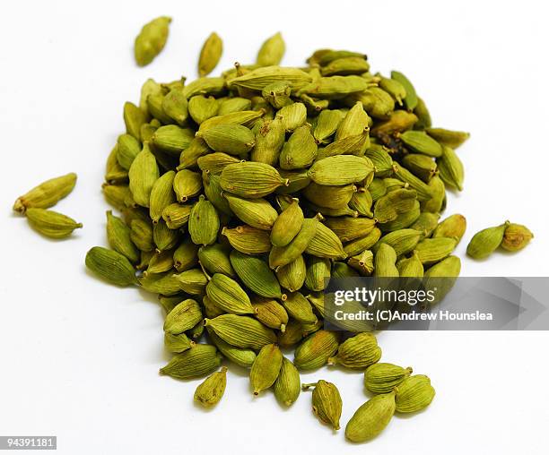 spice - a pile of green cardamom pods - cardamom stock pictures, royalty-free photos & images