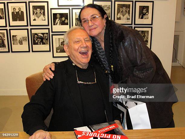 Photographer Ron Galella poses with Mary Ellen Mark as he promotes copies of his new book titled "Viva L'Italia" at the Clic Gallery on December 12,...