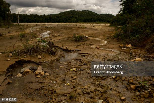 Sand and mud sits on the property of state gold processor Minerven in El Callao, Bolivar State, Venezuela, on Tuesday, Feb. 27, 2018. The military...