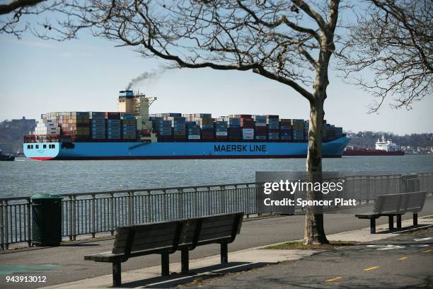 Cargo ship owned by Maersk arrives into New York harbor on April 9, 2018 in New York City. As a potential trade war with China continues to spook...