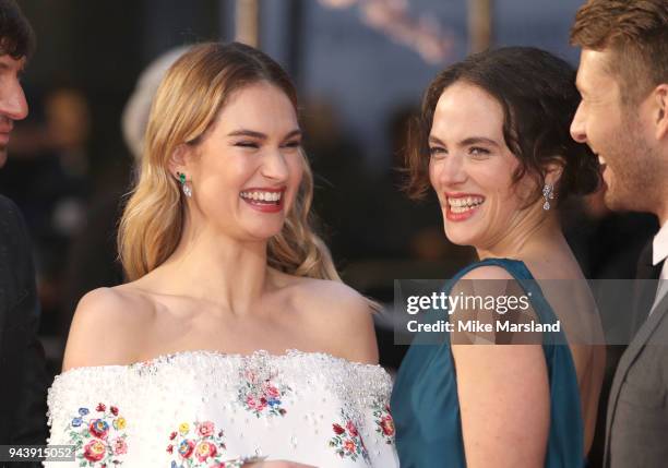 Jessica Brown Findlay and Lily James attend 'The Guernsey Literary And Potato Peel Pie Society' World Premiere at The Curzon Mayfair on April 9, 2018...