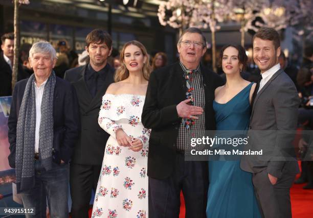 Tom Courtenay, Michael Hulsman, Lily James, Mike Newell, Jessica Brown Findlay and Glen Powell attend 'The Guernsey Literary And Potato Peel Pie...