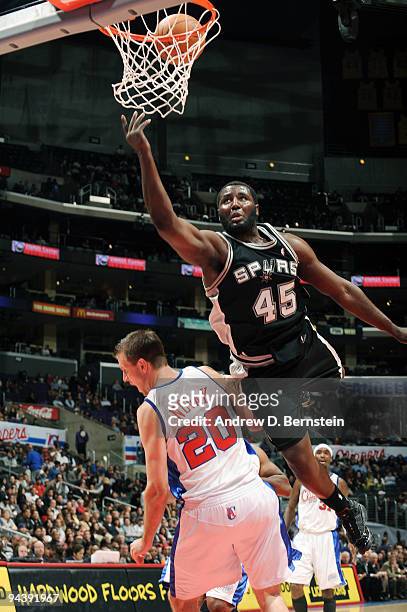 DeJuan Blair of the San Antonio Spurs goes up for a shot against Steve Novak of the Los Angeles Clippers at Staples Center on December 13, 2009 in...