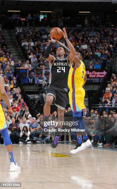 Buddy Hield of the Sacramento Kings puts up a shot against the Golden State Warriors on March 31, 2018 at Golden 1 Center in Sacramento, California....