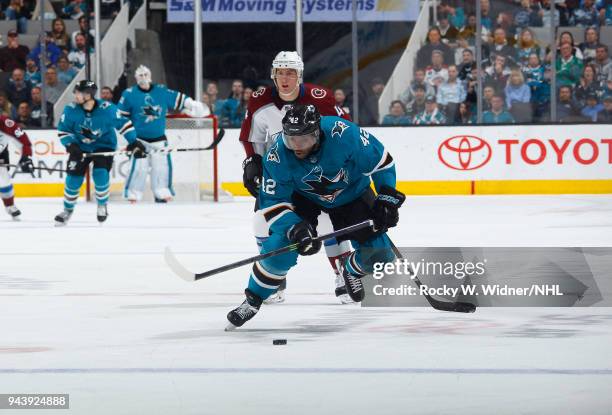 Joel Ward of the San Jose Sharks skates with the puck against the Colorado Avalanche at SAP Center on April 5, 2018 in San Jose, California. Joel Ward