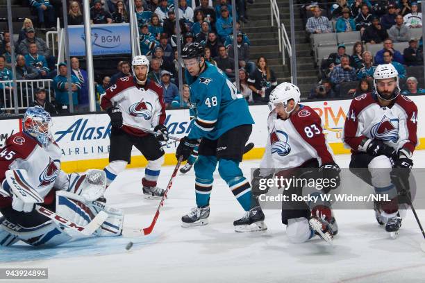 Jonathan Bernier and Matt Nieto of the Colorado Avalanche defend the net against sh48 of the San Jose Sharks at SAP Center on April 5, 2018 in San...