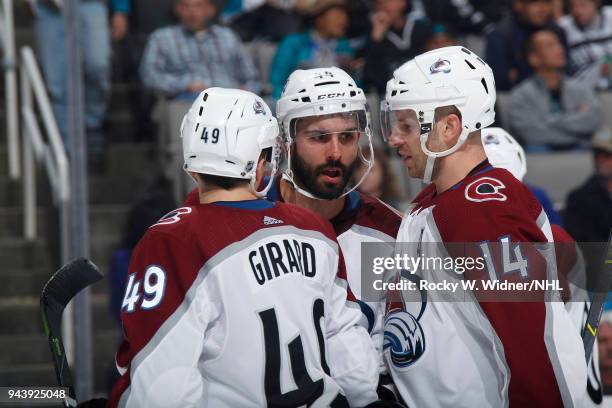 Samuel Girard, Mark Barberio and Blake Comeau of the Colorado Avalanche talk during the game against the San Jose Sharks at SAP Center on April 5,...