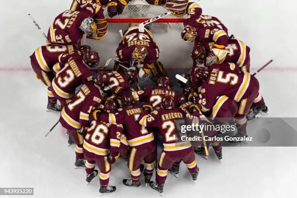 The Minnesota-Duluth Bulldogs prepare to take on the Notre Dame Fighting during the Division I Men's Ice Hockey Semifinals held at the Xcel Energy...