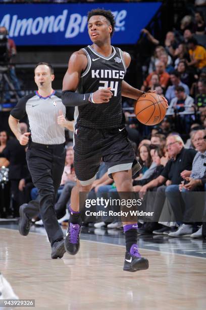 Buddy Hield of the Sacramento Kings brings the ball up the court against the Golden State Warriors on March 31, 2018 at Golden 1 Center in...