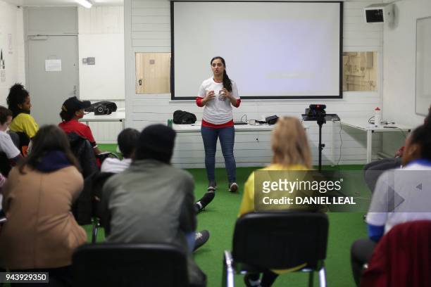 Former Afghanistan women's football captain Khalida Popal speaks during a motivational session with young women in south London on March 30, 2018. -...