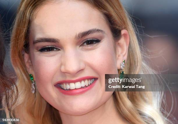 Lily James attends 'The Guernsey Literary And Potato Peel Pie Society' World Premiere at The Curzon Mayfair on April 9, 2018 in London, England.