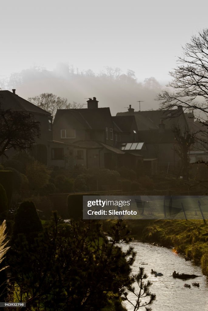 A Small Brook Runs Behind Houses Beneath Ruins Of Peveril Castle, Castleton