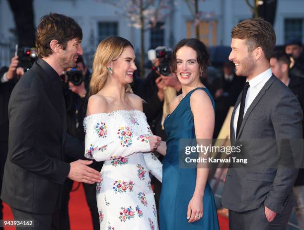 Michiel Huisman, Lily James, Jessica Brown Findlay and Glen Powell attend 'The Guernsey Literary And Potato Peel Pie Society' World Premiere at The...