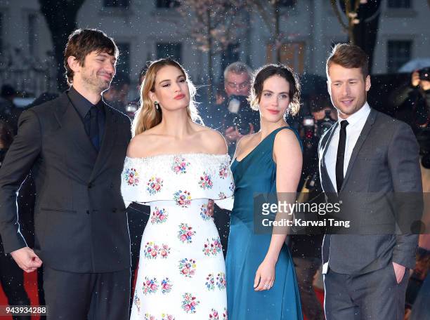 Michiel Huisman, Lily James, Jessica Brown Findlay and Glen Powell attend 'The Guernsey Literary And Potato Peel Pie Society' World Premiere at The...