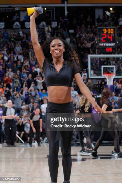 The Sacramento Kings dance team hands out gifts during the game against the Golden State Warriors on March 31, 2018 at Golden 1 Center in Sacramento,...