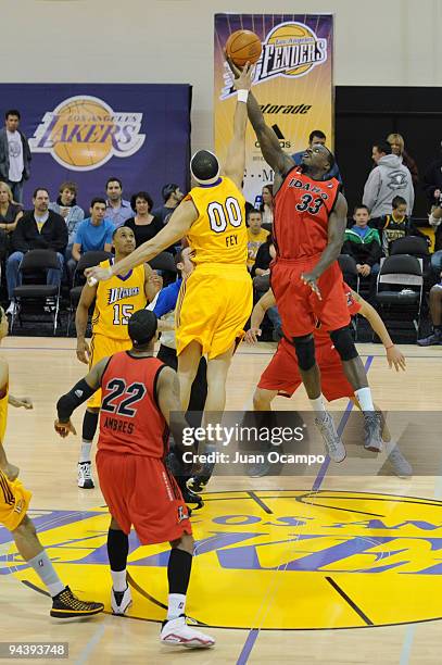 Bryson McKenzie of the Idaho Stampede and Michael Fey of the Los Angeles D-Fenders jump ball to start a D-League game on December 13, 2009 at the...