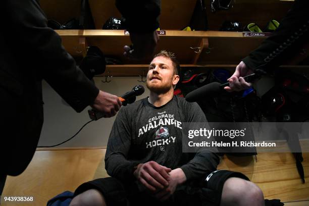 Colorado Avalanche center Colin Wilson speaks with members of the media after practice at the Family Sports Ice Arena on April 9, 2018 in Centennial,...