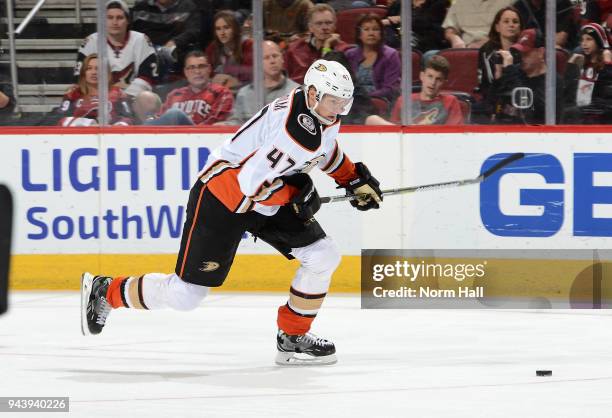 Hampus Lindholm of the Anaheim Ducks skates the puck up ice against the Arizona Coyotes at Gila River Arena on April 7, 2018 in Glendale, Arizona.