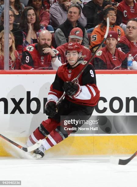 Clayton Keller of the Arizona Coyotes stops along the boards against the Anaheim Ducks at Gila River Arena on April 7, 2018 in Glendale, Arizona.