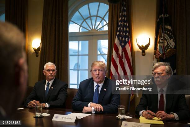 President Donald Trump, center, speaks during a meeting with senior military leadership in the Cabinet Room of the White House in Washington, D.C.,...