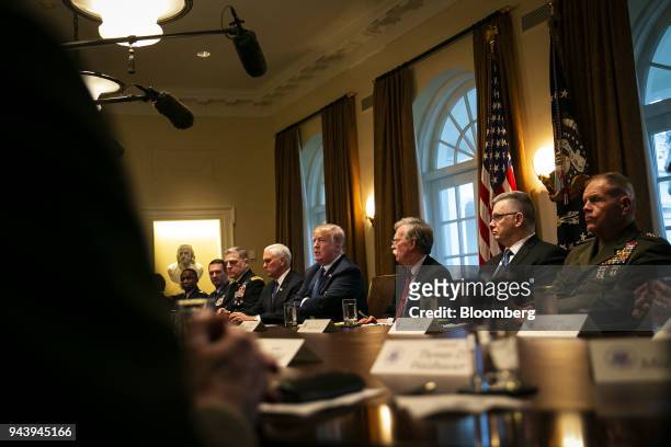 President Donald Trump, center, speaks during a meeting with senior military leadership in the Cabinet Room of the White House in Washington, D.C.,...