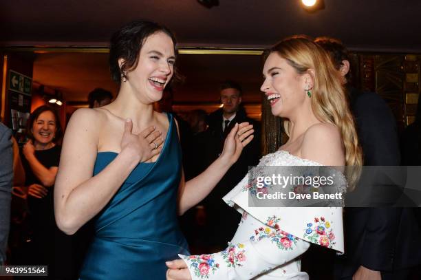 Jessica Brown Findlay and Lily James attend the World Premiere of "The Guernsey Literary And Potato Peel Pie Society" at The Curzon Mayfair on April...