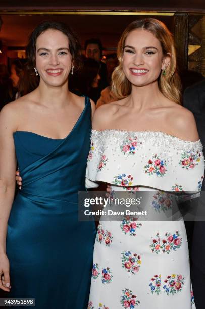 Jessica Brown Findlay and Lily James attend the World Premiere of "The Guernsey Literary And Potato Peel Pie Society" at The Curzon Mayfair on April...