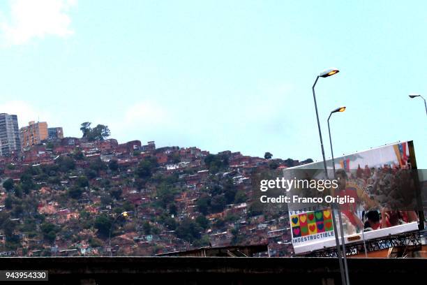 Billboard faeturing Venezuelan President Nicolas Maduro is seen in front of a Caracas barrio on April 8, 2018 in Caracas, Venezuela. Venezuela is in...