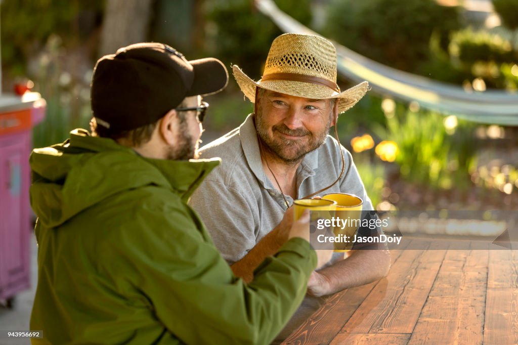 Happy Smiling Mid Adult Man Drinking Coffee