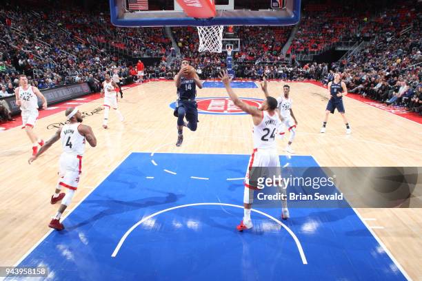 Ish Smith of the Detroit Pistons goes to the basket against the Toronto Raptors on April 9, 2018 at Little Caesars Arena in Detroit, Michigan. NOTE...