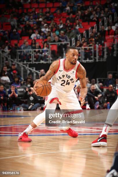 Norman Powell of the Toronto Raptors handles the ball against the Detroit Pistons on April 9, 2018 at Little Caesars Arena in Detroit, Michigan. NOTE...