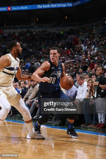 Milwaukee, WI Aaron Gordon of the Orlando Magic handles the ball against the Milwaukee Bucks on April 9, 2018 at the BMO Harris Bradley Center in...