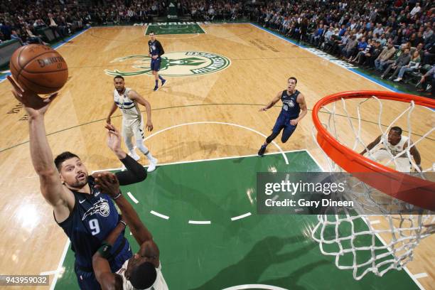 Milwaukee, WI Nikola Vucevic of the Orlando Magic shoots the ball against the Milwaukee Bucks on April 9, 2018 at the BMO Harris Bradley Center in...