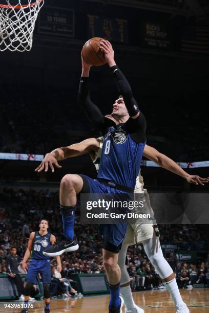 Milwaukee, WI Mario Hezonja of the Orlando Magic goes to the basket against the Milwaukee Bucks on April 9, 2018 at the BMO Harris Bradley Center in...
