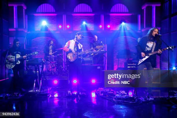 Episode 670 -- Pictured: Anthony LaMarca, David Hartley and Adam Granduciel of musical guest 'The War on Drugs' peform on April 9, 2018 --