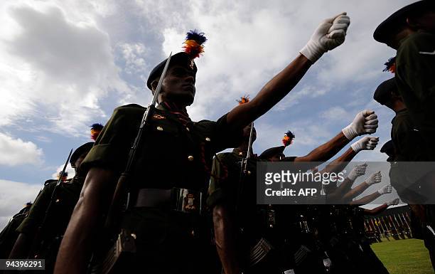 Sri Lankan special forces take part in a ceremony commemorating the victory over Tamil Tiger rebels at army headquarters in Colombo on December 14,...